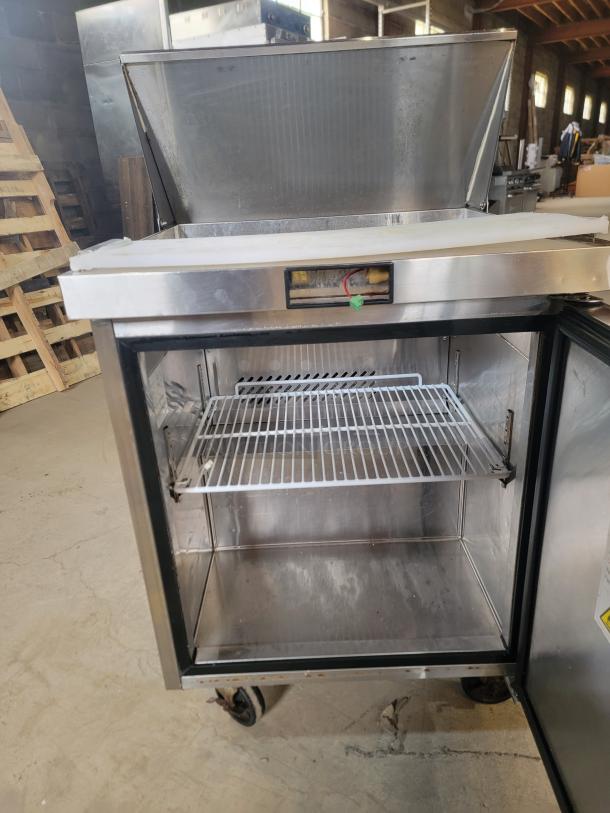 Atosa MSF8301GR Mega Top Sandwich/Salad Prep Refrigerator, stainless steel, open top, wire shelving, on casters, ideal for restaurants.