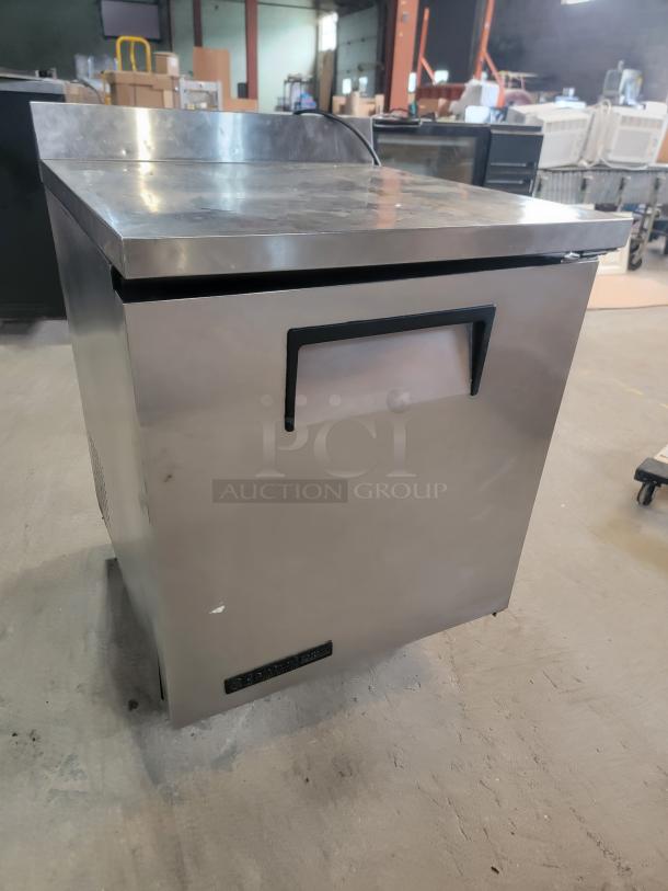 True TWT-27 commercial worktop refrigerator with stainless steel finish on casters, ideal for commercial kitchens.