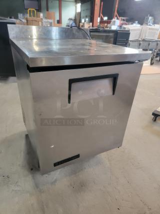 True TWT-27 commercial worktop refrigerator with stainless steel finish on casters, ideal for commercial kitchens.