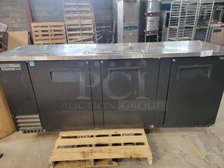True TDD-4-HC commercial draft beer dispenser with 4 taps, black finish, stainless steel top, tested and working, ideal for bars.