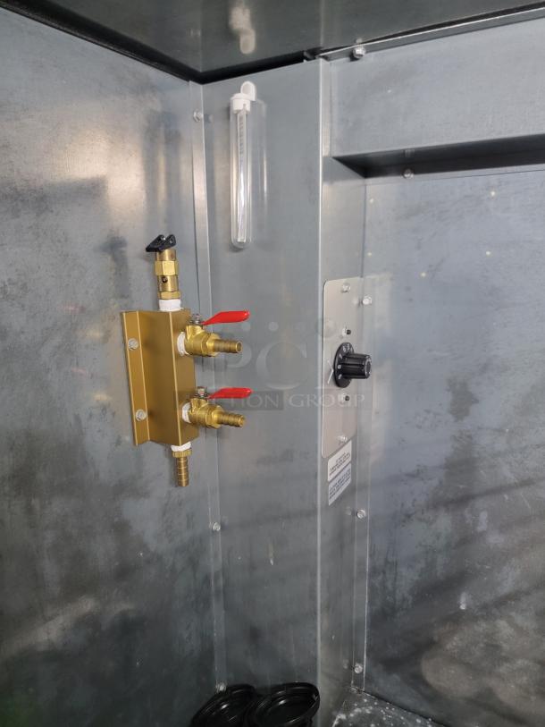 True TDD-4-HC draft beer dispenser interior with brass fittings, two red-handled levers, and temperature gauge. Tested and working.