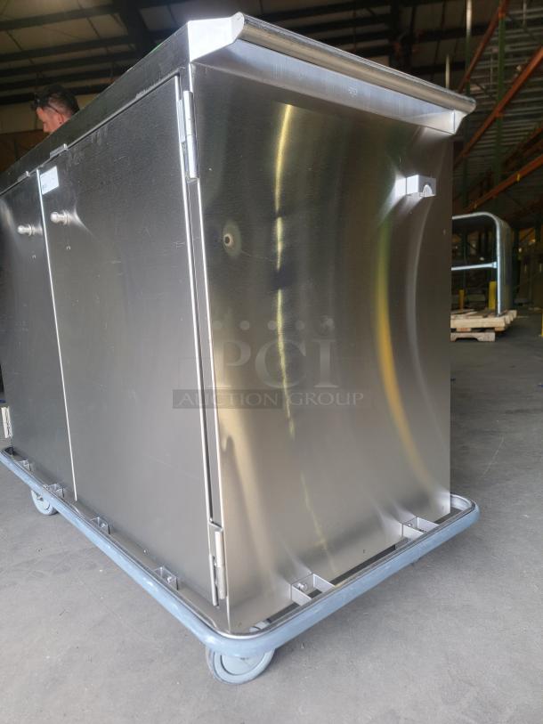 Stainless steel enclosed mobile case cart by Suburban Surgical Company, Model Tote-AL Type C, in excellent condition.