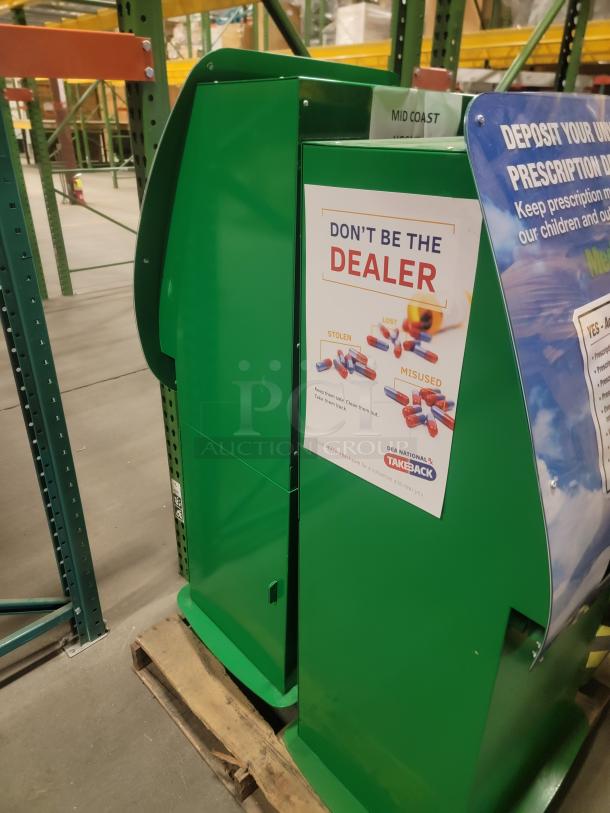 MedReturn secure drop-off kiosk, bright green, features anti-drug abuse poster, ideal for sensitive item disposal.