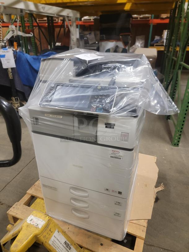 Ricoh MP 3554SP multifunction printer; print, copy, scan, and fax. Packaged, with control panel visible. Ideal for office use.