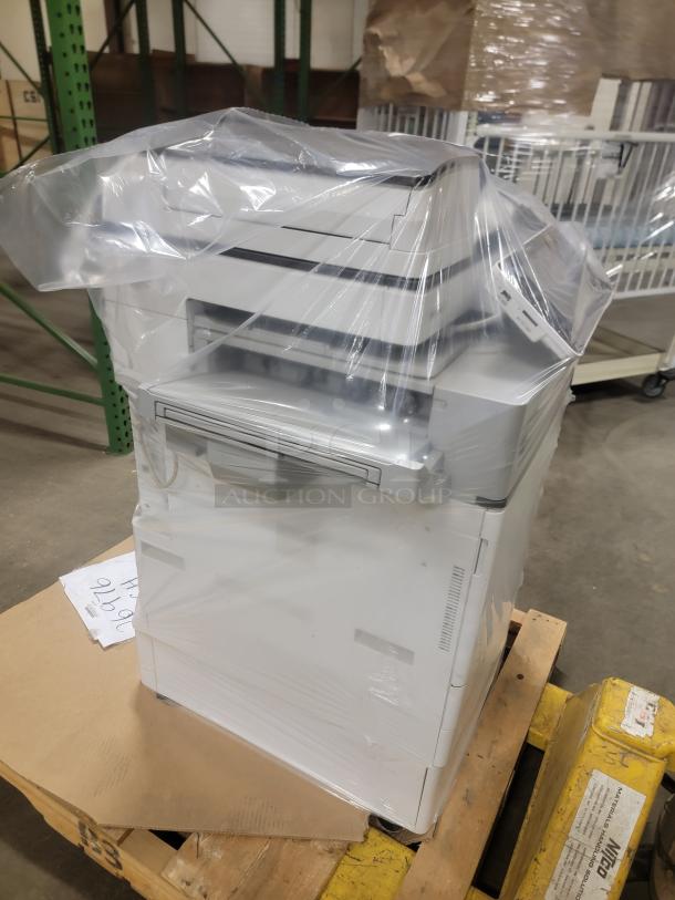 Ricoh MP 3554SP Multifunction Printer, wrapped, for printing, copying, scanning, faxing. Ideal for office productivity.