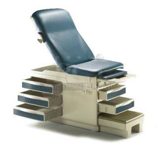 Ritter 104 examination table with adjustable blue cushioned seat, five storage drawers, sturdy design, and manual included.