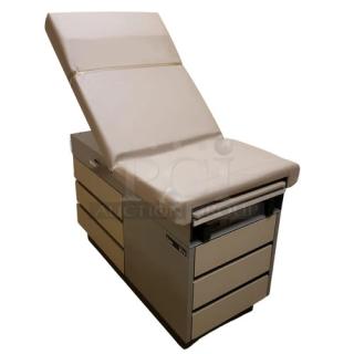 Ritter 104 Examination Table, heavy-duty, multi-purpose; ideal for medical use, pet grooming, plant repotting. Sturdy build.