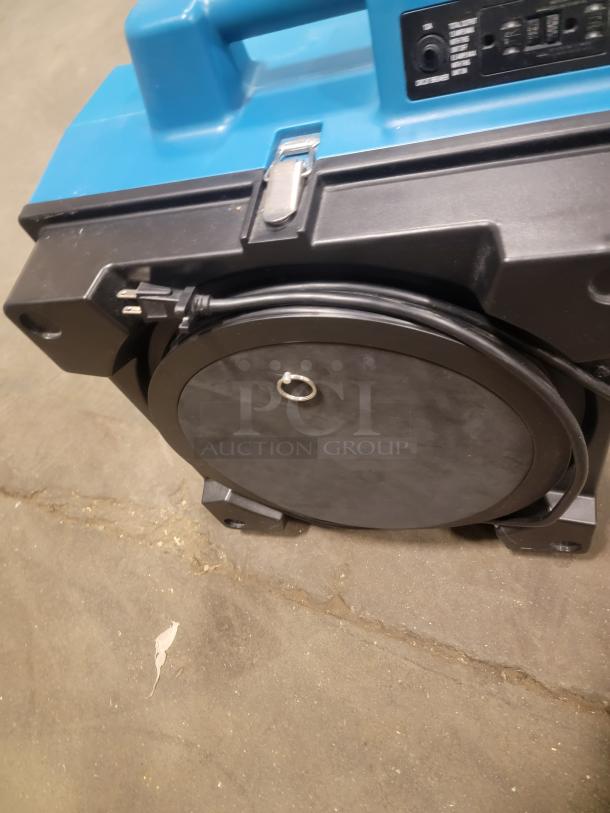 X-Power X-3400A air scrubber; blue and black design with handle, visible control panel; 115V/60Hz/2.8A rating.