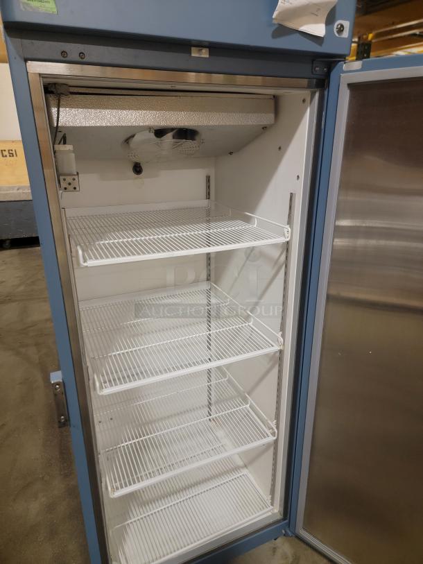 Helmer Horizon Series HLF120 Freezer, medical-grade, four shelves, open door, robust design for professional use.