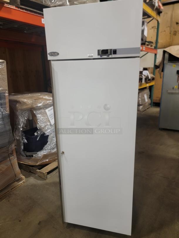 Norlake Model NSPF241WWW/0 freezer for auction, white exterior, built for precise temperature control, ideal for restaurants.