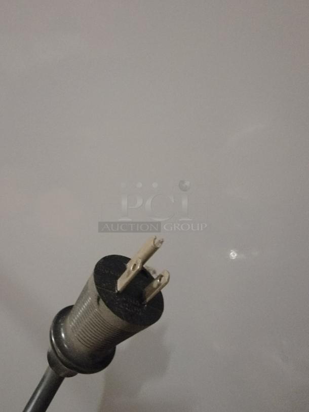 Power plug for Norlake Commercial Freezer Model NSPF241WWW/0, showing a standard three-prong design.
