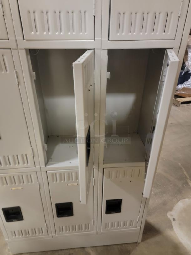 Tennsco lockers, model TTS-121824-CMG, featuring 9 padlock hasp slots. Two units shown, doors open, excellent condition.