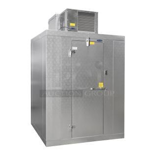 Commercial walk-in freezer, metal finish, with cooling unit on top. Features locking handle and visible safety signage.