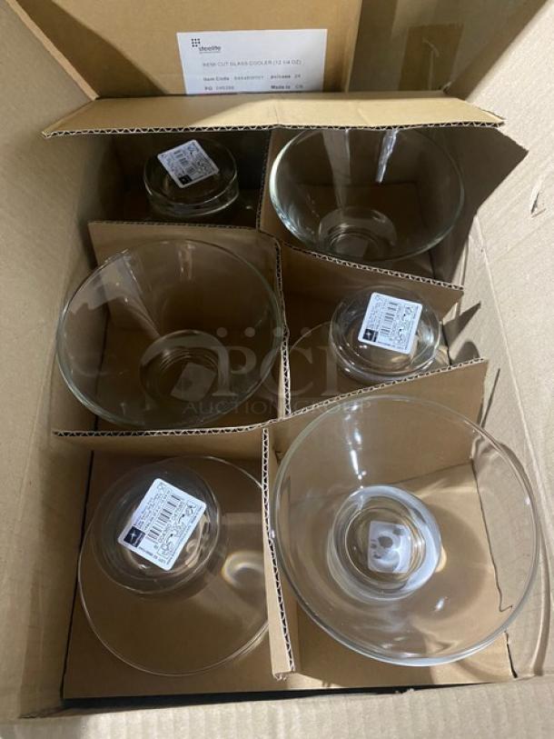 Set of six new glass bowls in a box, each labeled with product details and barcode, arranged in cardboard sections.