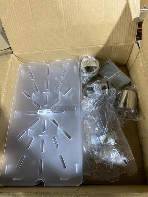 Cardboard box with a transparent plastic tray and multiple small metal and plastic parts in packaging, ready for assembly.