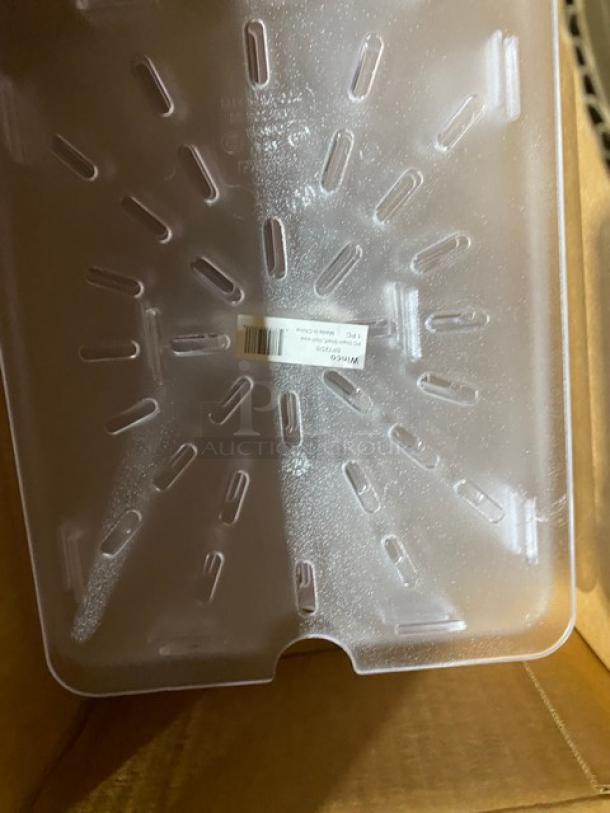 Clear plastic tray with drainage slots, new condition, barcode label indicating "WINCO" PPL-4, placed inside a cardboard box.