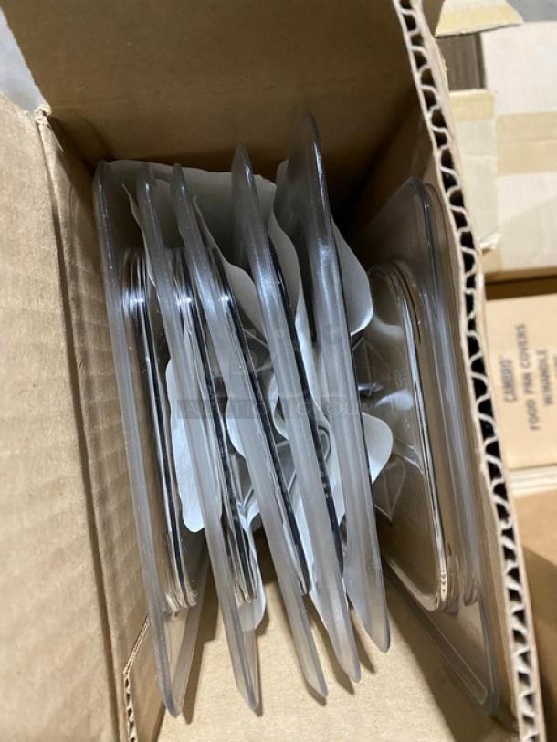 Box of clear plastic clamshell packaging, neatly stacked, in excellent condition, ready for product display or protection.
