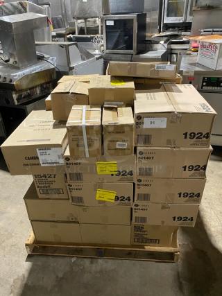 Pallet stacked with assorted boxed kitchen equipment, labels indicate Cambro food storage, showing model numbers and barcodes.