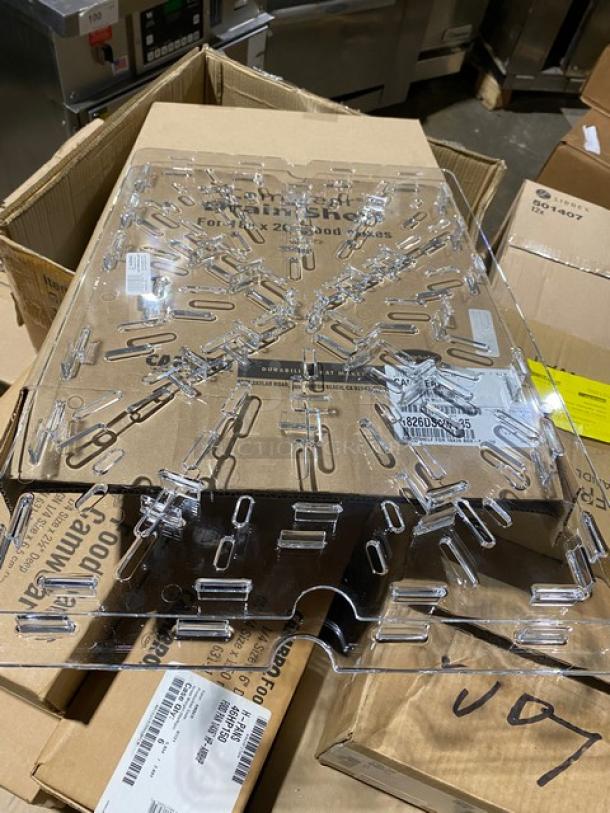 Transparent plastic cover with slots, placed on cardboard box. Labels indicate compatibility with Lux 2900 model. New condition.