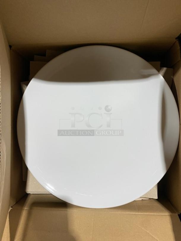 White ceramic plate in original packaging, diameter approximately 12 inches, pristine condition, no visible markings.