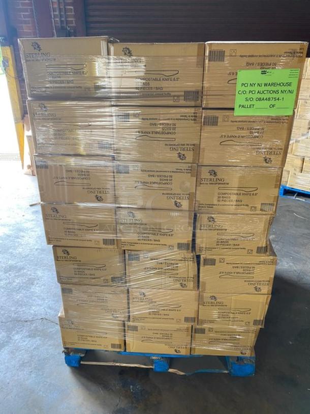 Pallet of Sterling disposable knives and forks, cardboard boxes, wrapped, new condition. Label: PCI NJ Warehouse, Auction details.