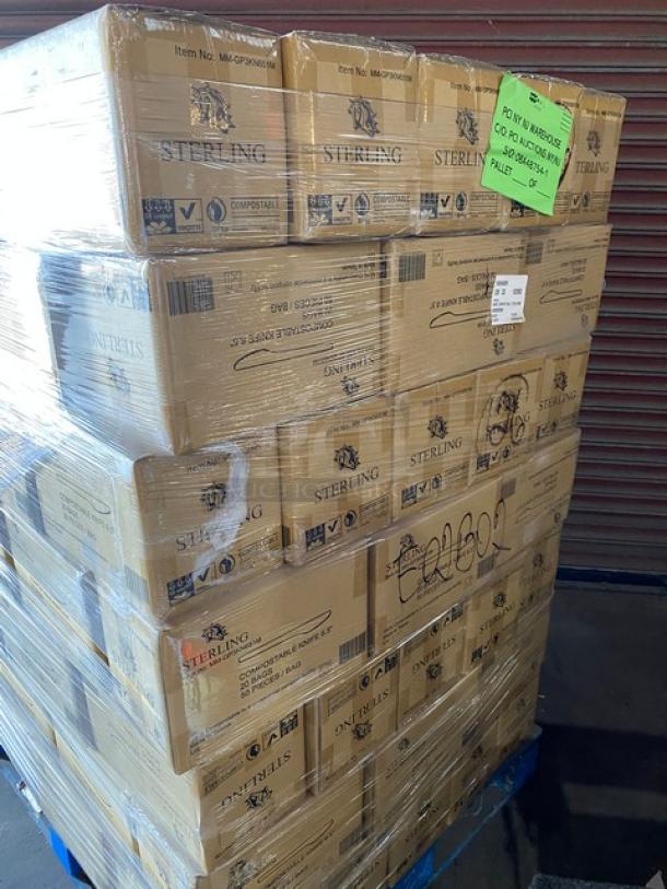 Pallet of boxed Sterling compostable cutlery, wrapped in plastic. Visible item number MA-000MM0364. Green tag with warehouse instructions.