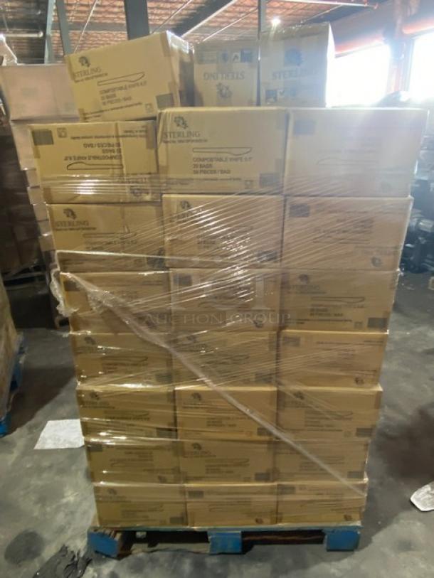 Pallet of Sterling compostable 9-inch plates in sealed boxes, bulk packaging.