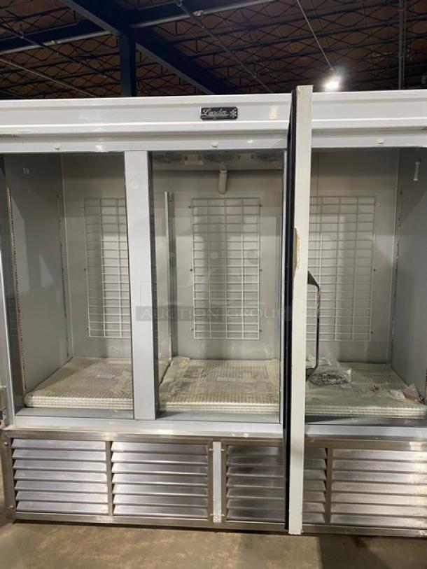 BRAND NEW! OUT OF THE BOX! Leader Commercial White Stainless Steel Solid 3 Door Reach In Freezer! With Poly Coated Wire Racks! - Image 5 of 9