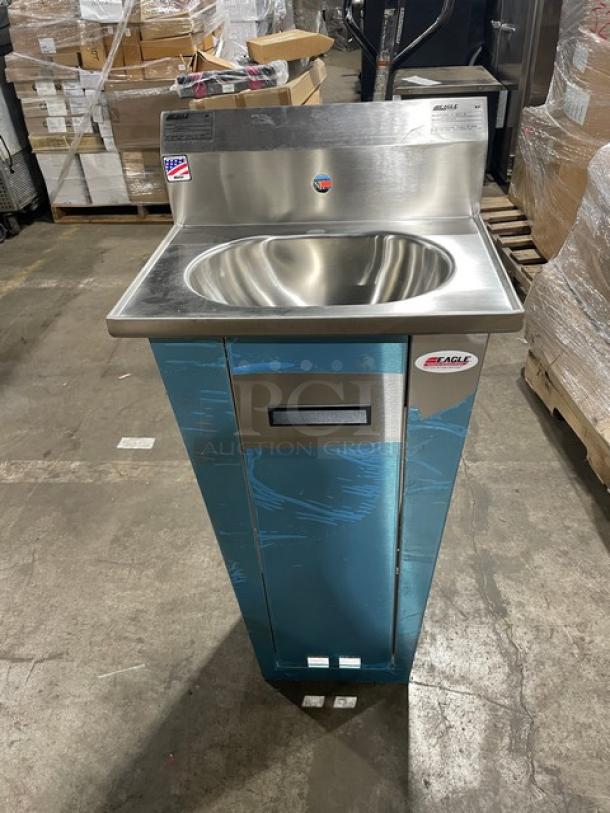 Brand new Eagle Group stainless steel pedestal hand washing sink, model YHSA-10-0275-00, with foot pedals and gooseneck faucet.