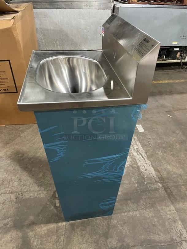 BRAND NEW Eagle Group stainless steel hand sink, pedestal style. Includes foot-operated pedals, goose neck faucet. Model YHSA100275.
