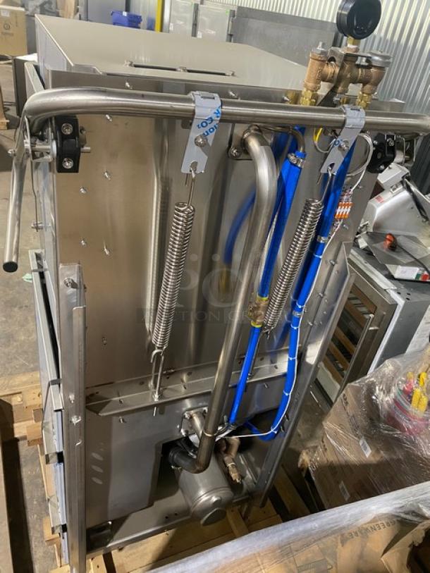 Brand new Champion DH6000 stainless steel door-type dishwasher, electric-powered, with booster, 208-240V, 3 Phase, on legs.