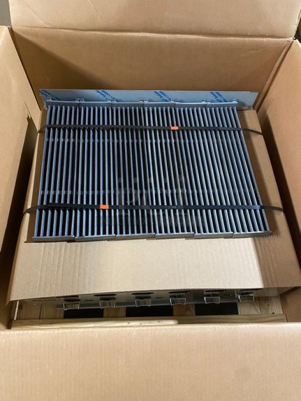 Brand new Vulcan Achiever Series radiant charbroiler, model VACB36-101, with stainless steel finish and cast iron diamond grates in box.