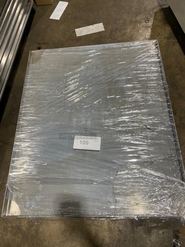 Adcraft ES3024 stainless steel equipment stand, brand new, with undershelf, back and side splash, on legs, wrapped in plastic.