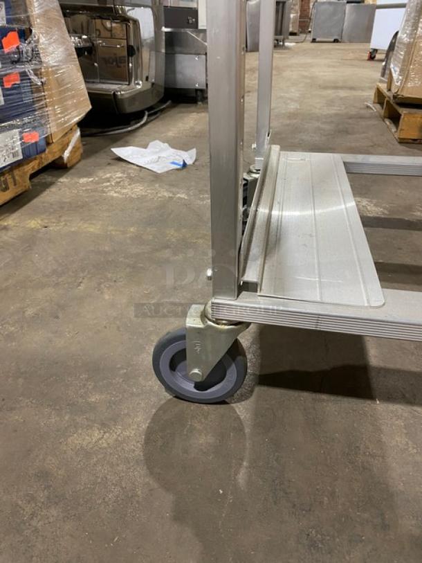 Cres-Cor aluminum 12-pan end load utility rack, model 207UA13A, on casters. New condition, ready for use in commercial settings.