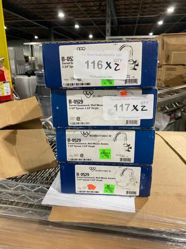 Stacked boxes containing brand new T&S B-0529 swivel gooseneck wall-mount faucets, chrome-plated, in original packaging.