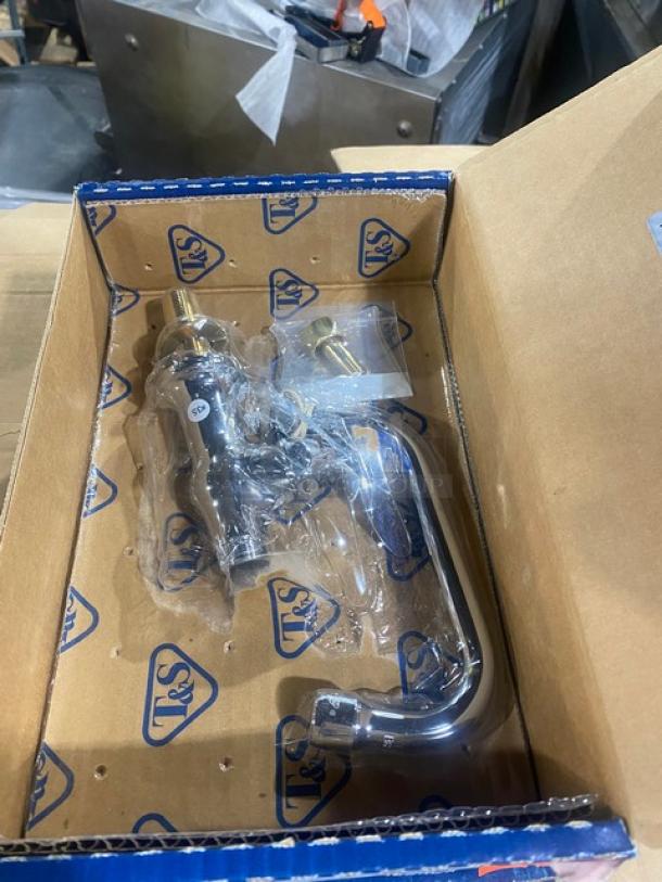 Brand new T&S B0207 chrome deck mount pantry faucet with 6" swing nozzle in original packaging.