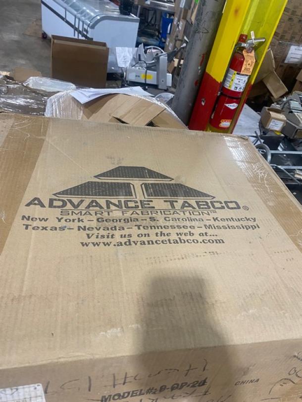 Brand new Advance Tabco stainless steel mop sink, model 9OP20, in original packaging.