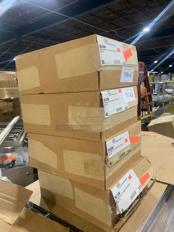 Stack of T&S boxes containing new Model 062XM chrome plated 12" swing nozzles. Marked and labeled for commercial use.