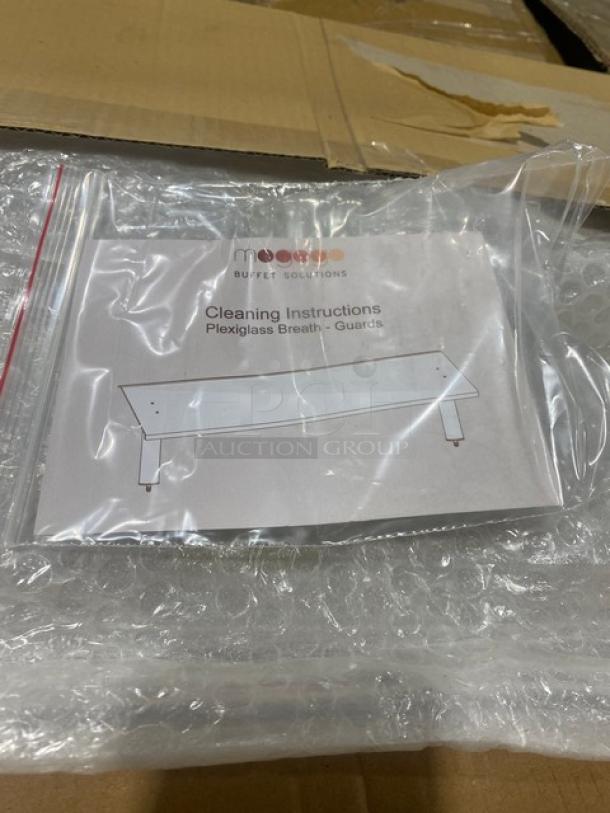 Brand new Steelite Mogogo Buffet acrylic sneeze guard, model SADDPL0101, with cleaning instructions, in original packaging.