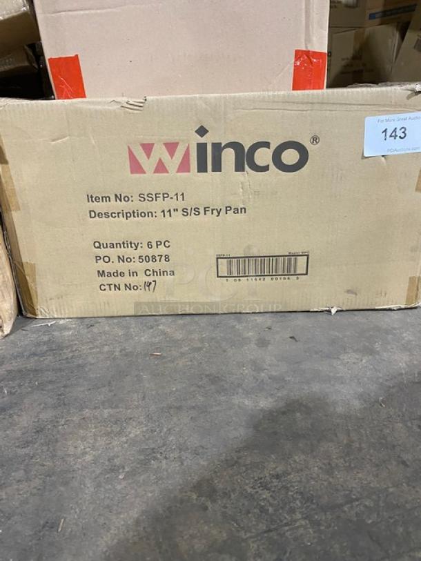 Brand new Winco SSFP-11 stainless steel 11" fry pan, commercial grade. Box shows item details and barcode.