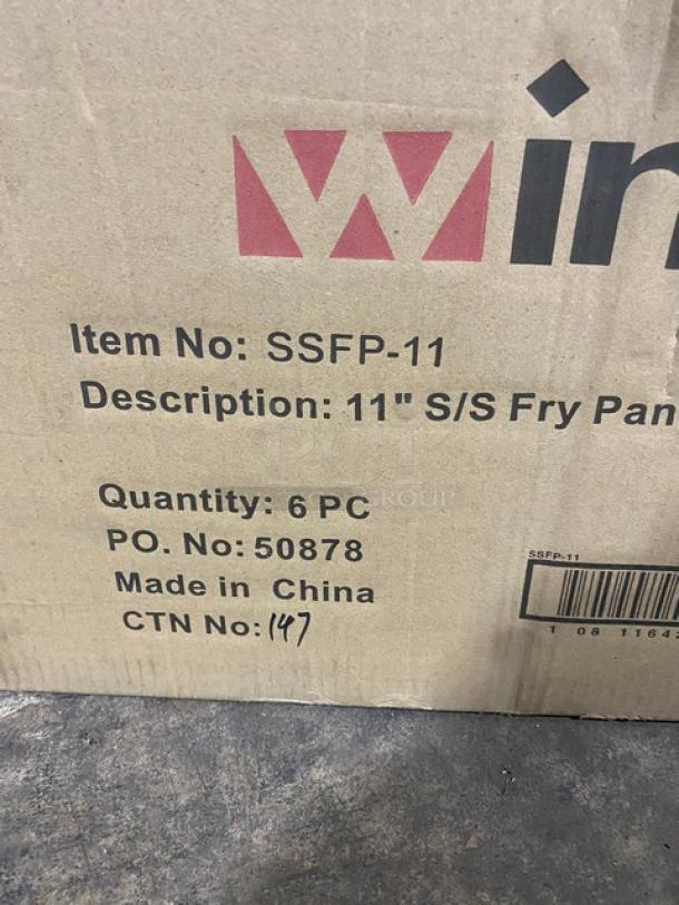 Winco 11" Stainless Steel Fry Pan, Model SSFP-11, 6 pieces per box, new condition. Box labeled with item details.