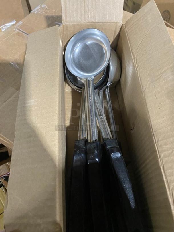 Brand new Vollrath 4 oz. stainless steel spoodles, model 61172, with black grip handles in box.