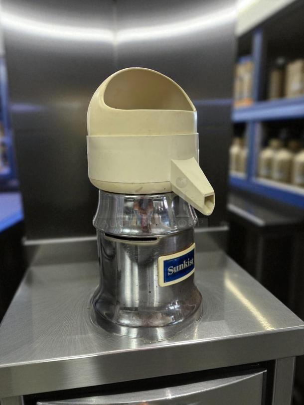 Vintage Sunkist 8-R commercial juicer in good condition, stainless steel body, labeled, tested and working.