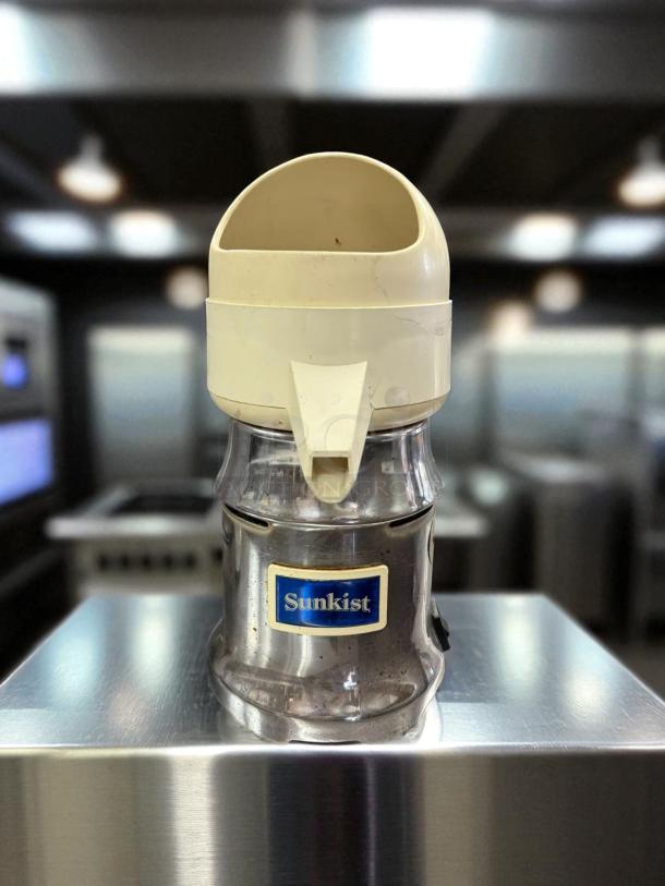 Vintage Sunkist 8-R JuiceExtractor, commercial juicer, stainless steel and cream, good condition, tested and working.