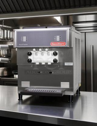 Great Condition - SaniServ 501 WATER Twist 22 Qt. Countertop Water Cooled Soft Serve Ice Cream Machine with 2 Hoppers - 208/230V - Tested & Working - Item #1193545