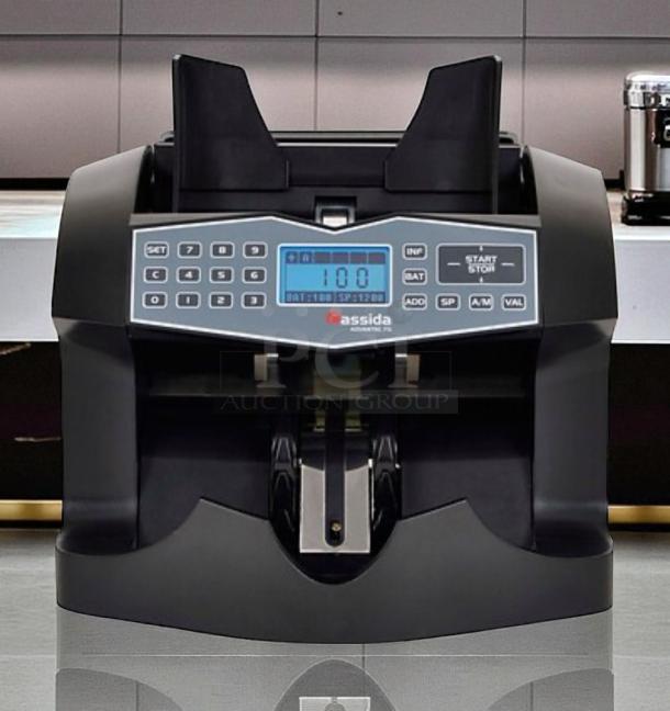 Cassida Advantec 75 bill counter, excellent condition, fully tested and working, 120V, with LCD display and keypad.