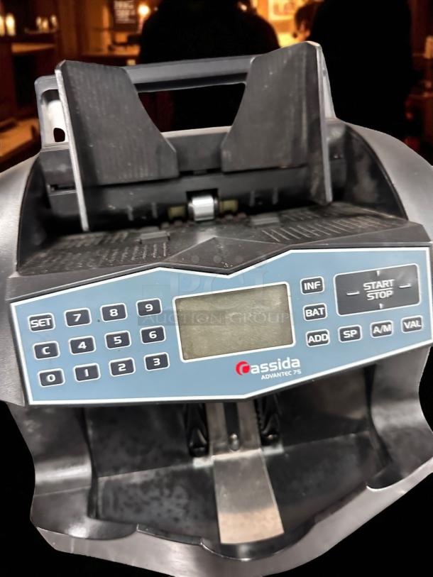 Cassida Advantec 75 bill counter, 120V, fully tested, excellent condition. Keypad, display, and brand label visible.