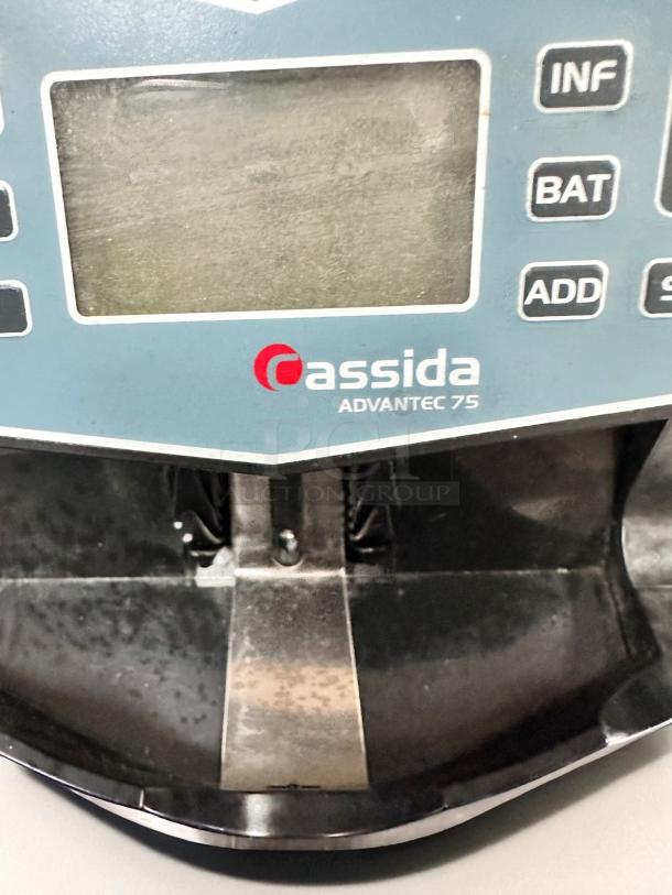 Cassida Advantec 75 bill counter, excellent condition, fully tested and working, 120V, model labeling visible.