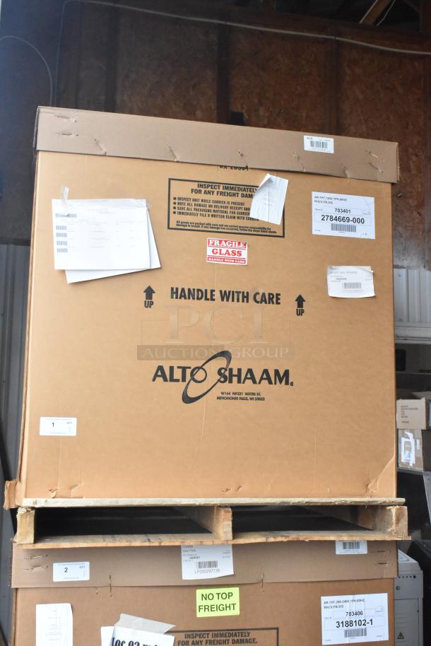 Brand new Alto Shaam AR-7HT heated cabinet in original box, labeled "Handle With Care." 120 volts, 1 phase, 8-pan capacity.