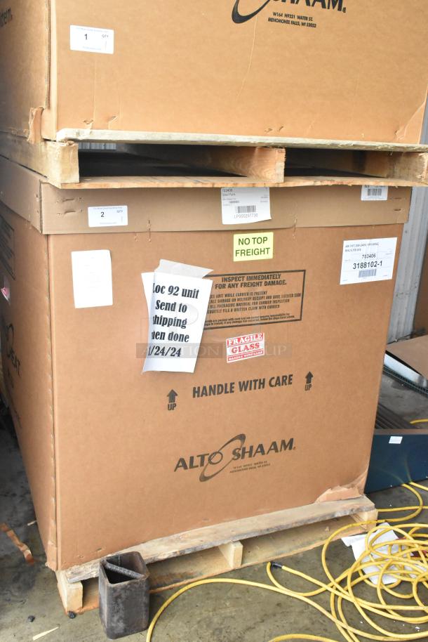 Boxed Alto Shaam AR-7HT stainless steel commercial heated cabinet, new, 8-pan capacity, 208-240V, 1 phase. Labels indicate shipment details.